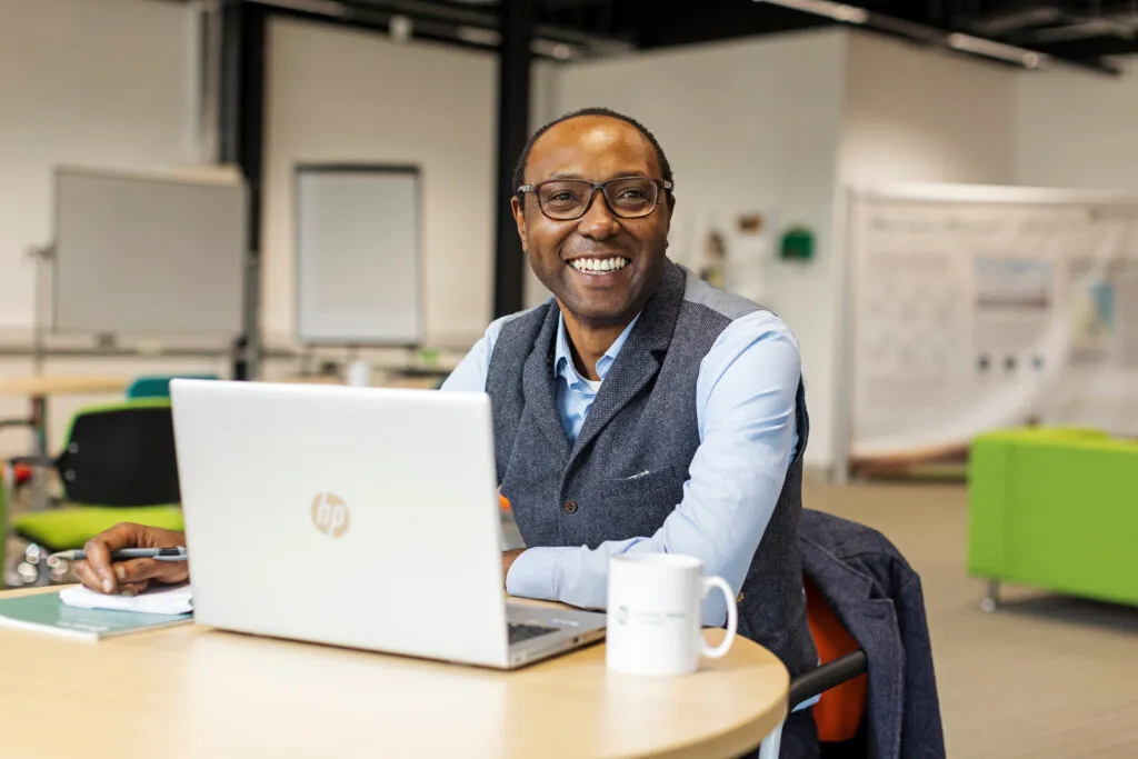 Man smiling at new job opportunities from nuclear waste solutions
